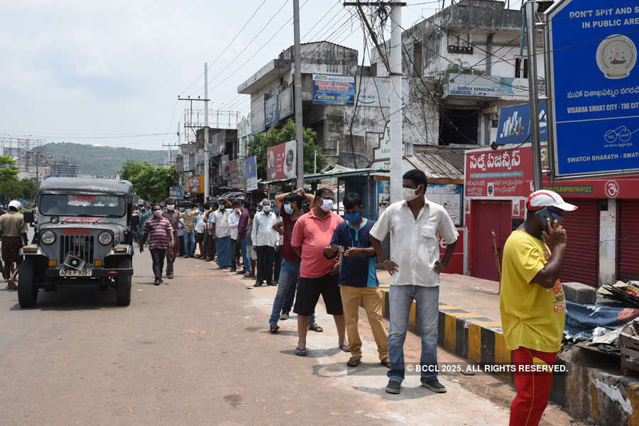 In pics: Long queues outside liquor shops as govt relaxes lockdown