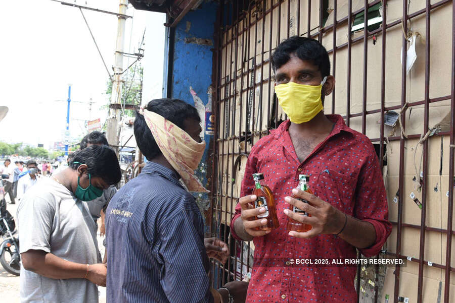 In pics: Long queues outside liquor shops as govt relaxes lockdown