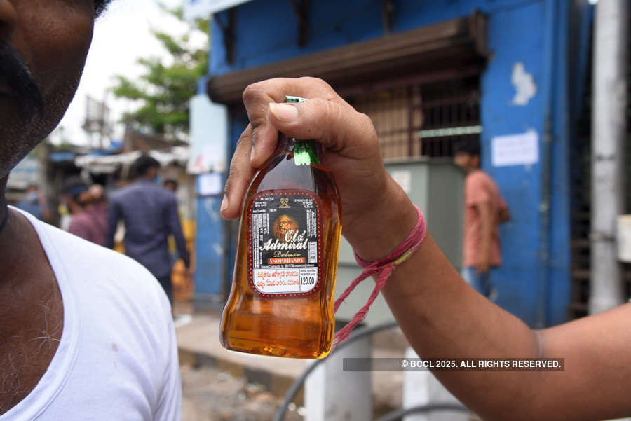 In pics: Long queues outside liquor shops as govt relaxes lockdown