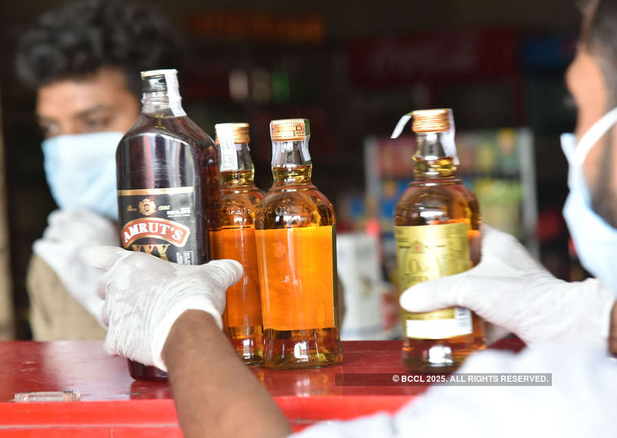 In pics: Long queues outside liquor shops as govt relaxes lockdown