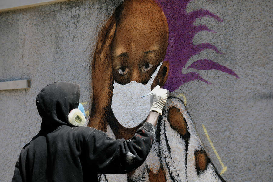 25 photos of coronavirus-themed street art from around the world