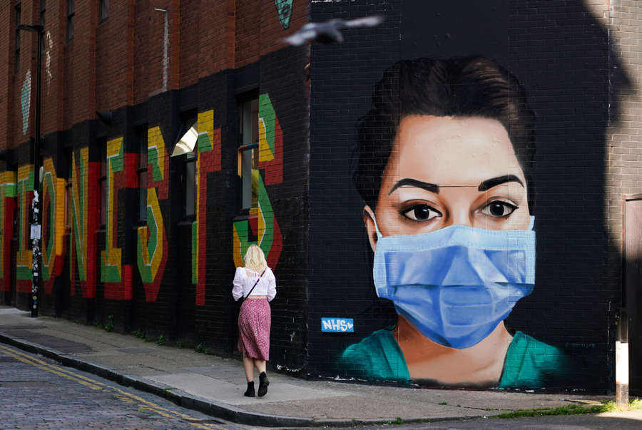 25 photos of coronavirus-themed street art from around the world