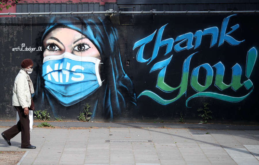 25 photos of coronavirus-themed street art from around the world