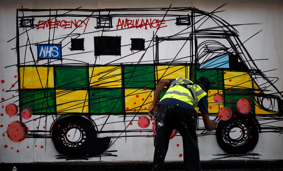 25 photos of coronavirus-themed street art from around the world