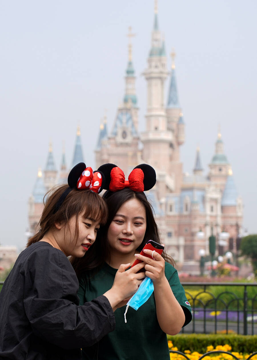 In pics: Shanghai Disneyland reopens with precautions