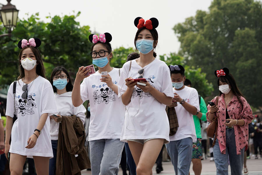 In pics: Shanghai Disneyland reopens with precautions