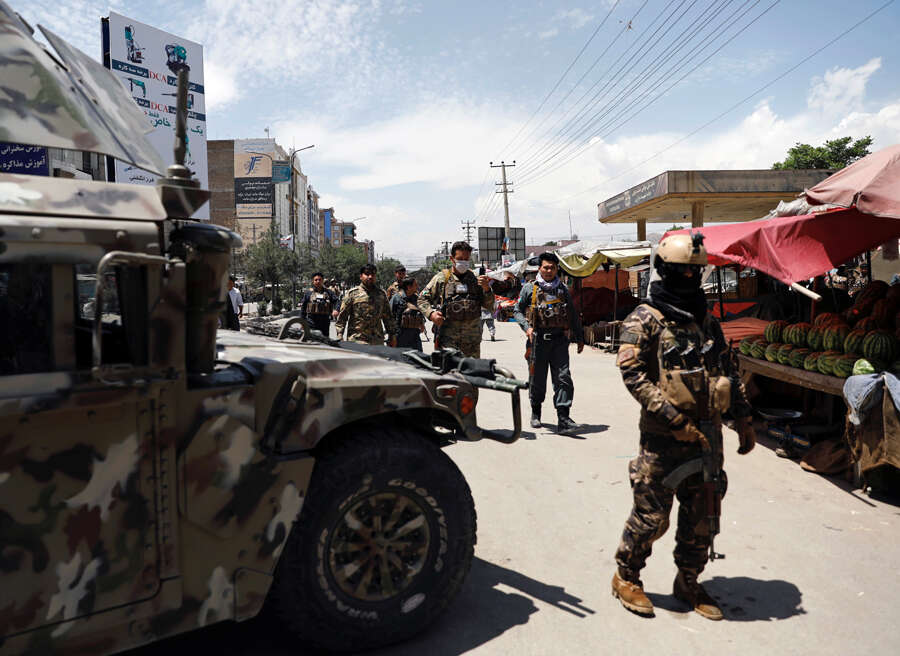 In pics: At least 16 killed as gunmen attack hospital in Kabul