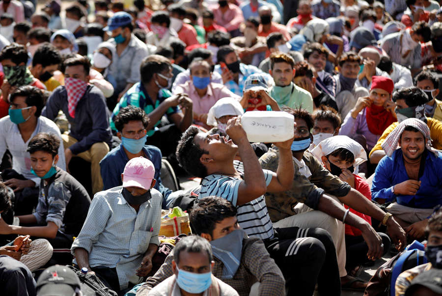 In pics: Stranded migrant workers desperate to return home