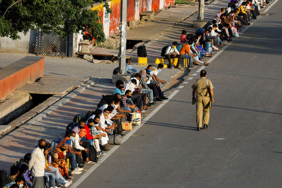 In pics: Stranded migrant workers desperate to return home