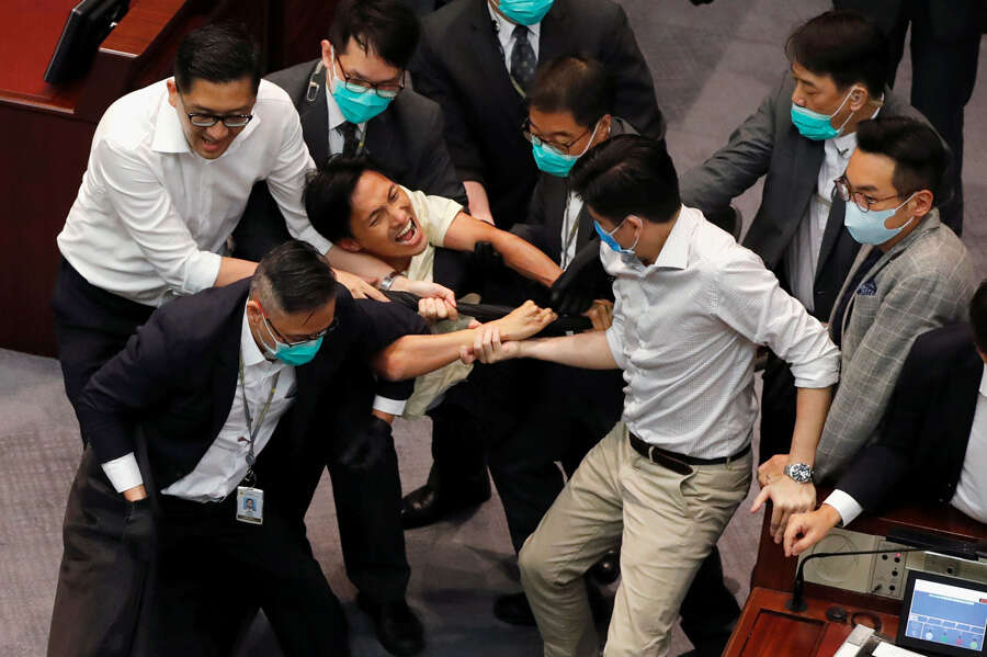 In pics: Hong Kong legislators trade blows 