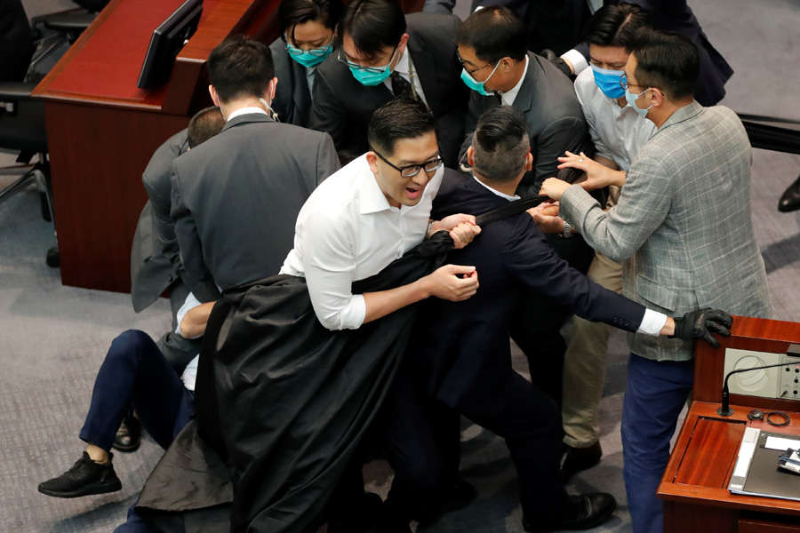 Hong Kong legislators trade blows