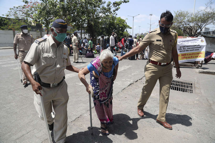 In pics: Stranded migrant workers desperate to return home