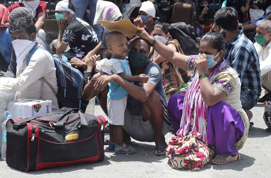 In pics: Stranded migrant workers desperate to return home