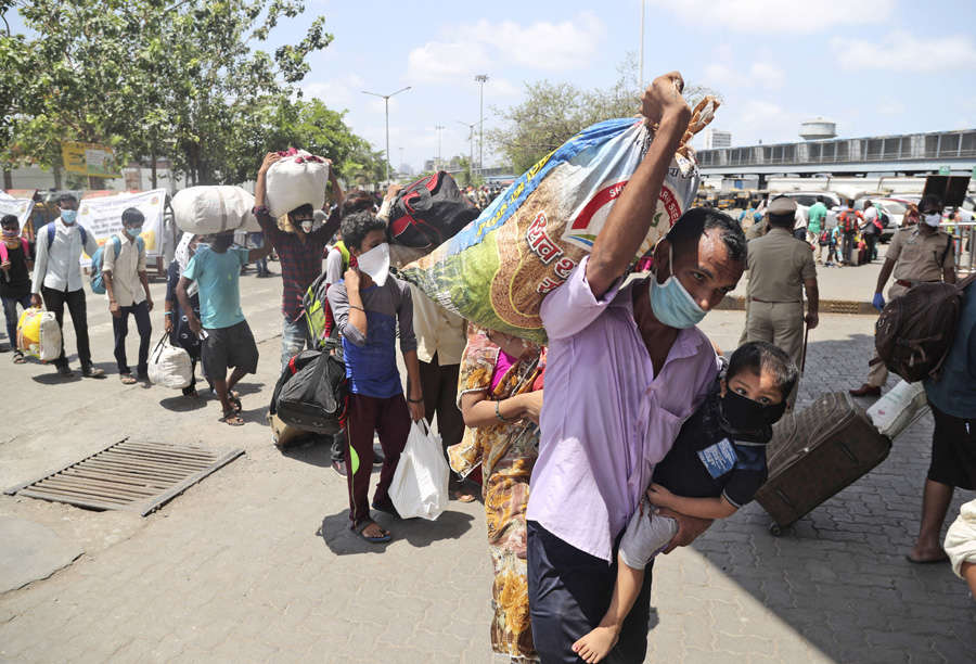 In pics: Stranded migrant workers desperate to return home