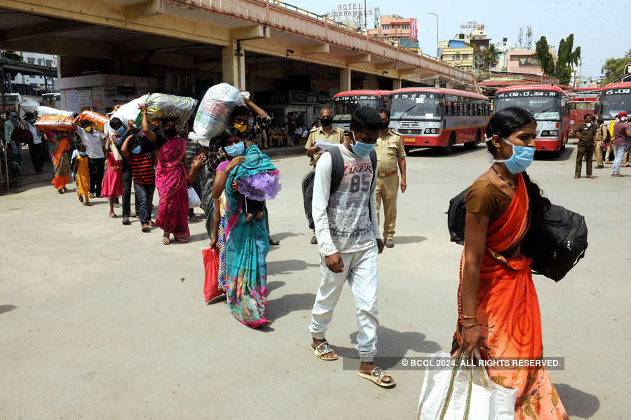 In pics: Stranded migrant workers desperate to return home