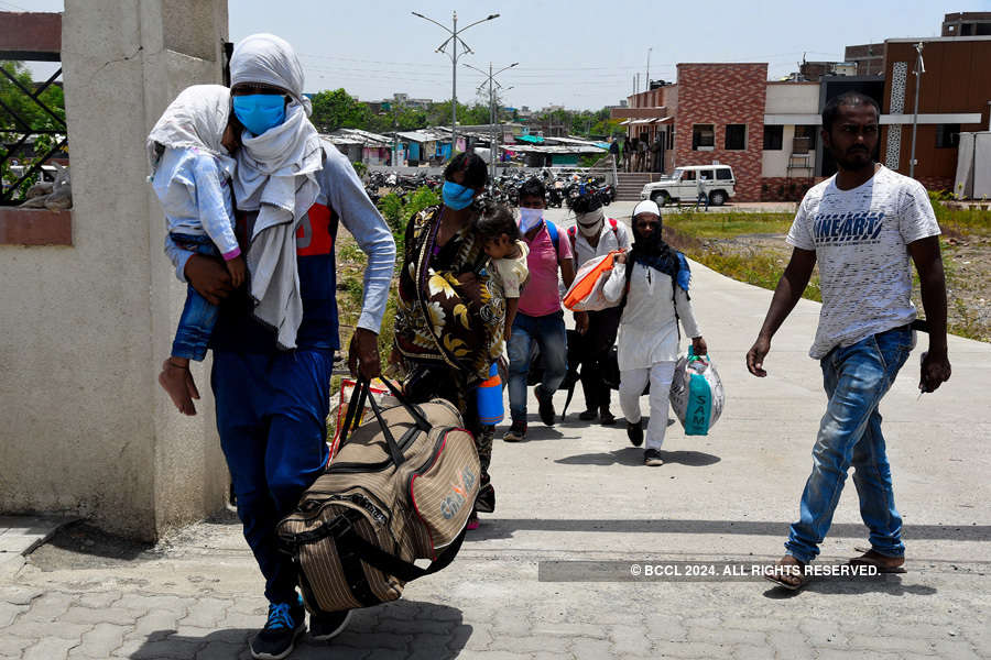 In pics: Stranded migrant workers desperate to return home