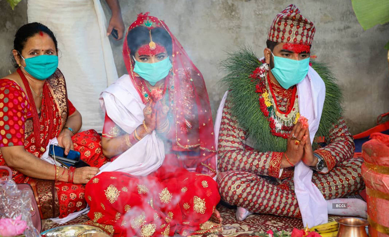 Lockdown weddings: Pictures of masked brides and grooms show that this is the new normal!