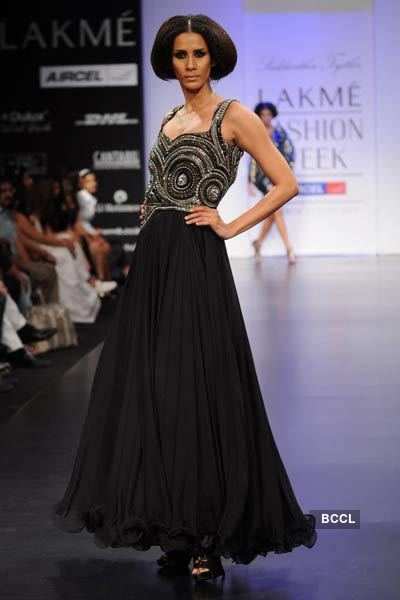 A model showcases a creation by designer Siddharth Tyler on Day 4 of ...