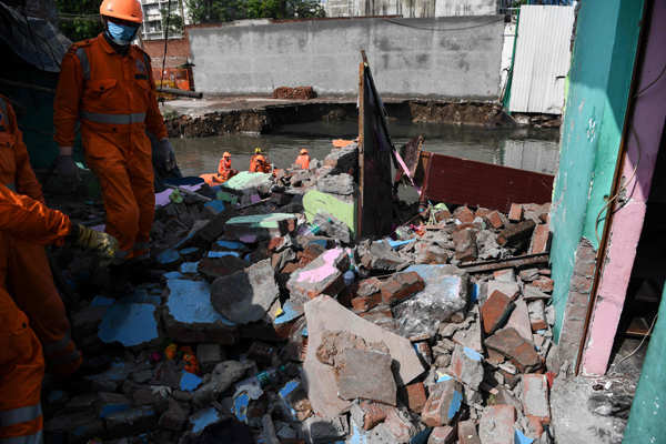 Four die, houses collapse in Delhi's first heavy monsoon rainfall