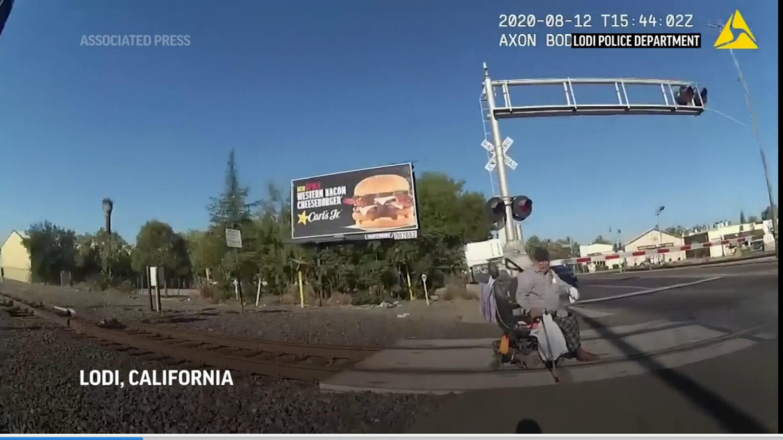 California officer rescues man from train