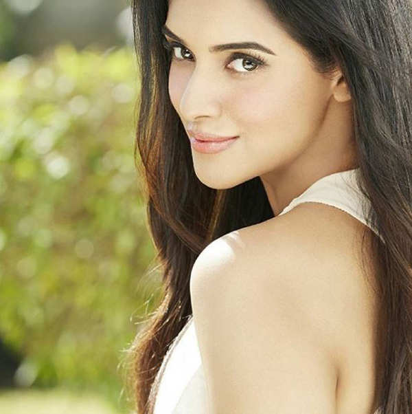 Asin ups the glam quotient with her ravishing pictures