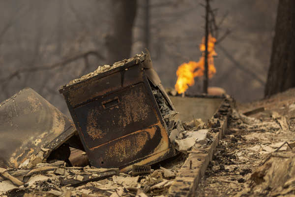 Wildfires turn California skies glowing orange