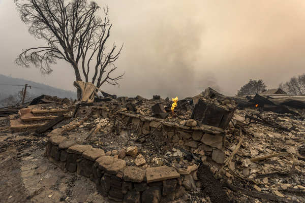 Wildfires turn California skies glowing orange