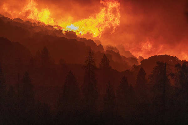 Wildfires turn California skies glowing orange