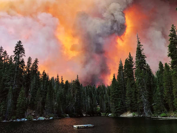 Wildfires turn California skies glowing orange