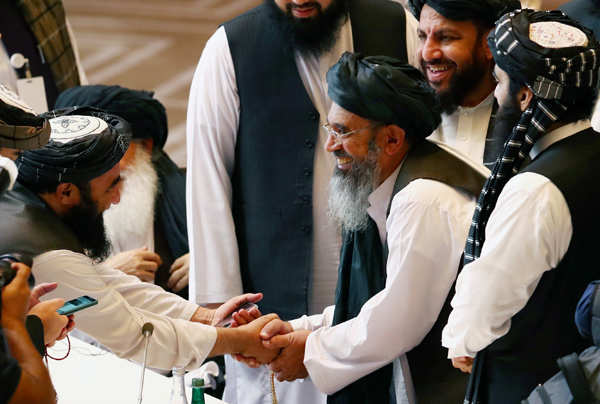 Historic peace talks between Afghan govt and Taliban open in Qatar