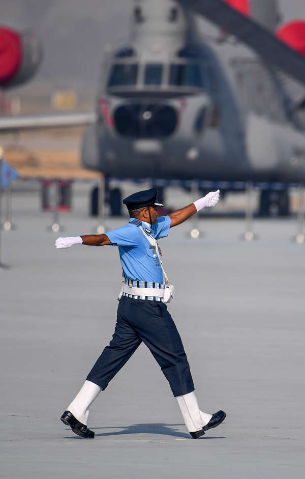 An Indian Air Force (IAF) soldier marches during the 88th Air Force Day  parade at Hindon Air Force station in Ghaziabad - Photogallery