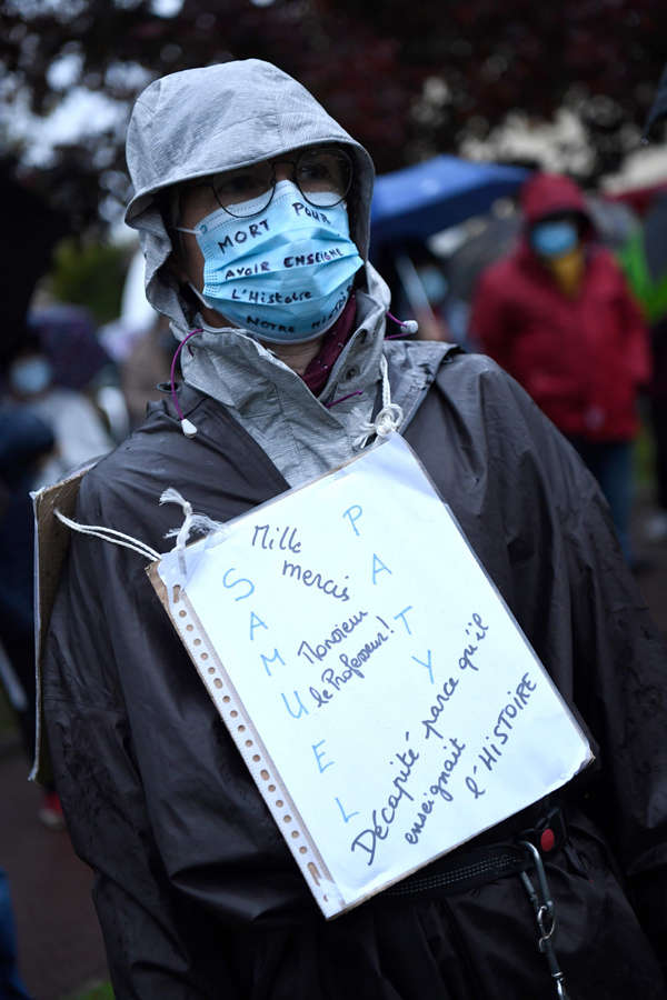 A Man Pays Tribute To The History Teacher Samuel Paty, Who Was Beheaded ...