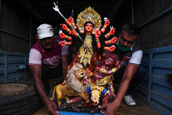 Devotees celebrate Durga Puja with COVID-19 safety protocols