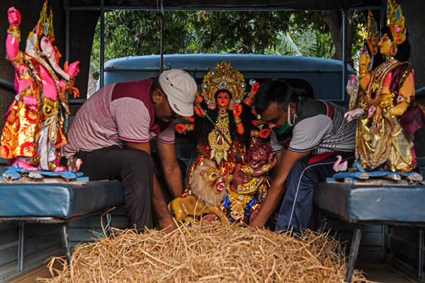 Devotees celebrate Durga Puja with COVID-19 safety protocols