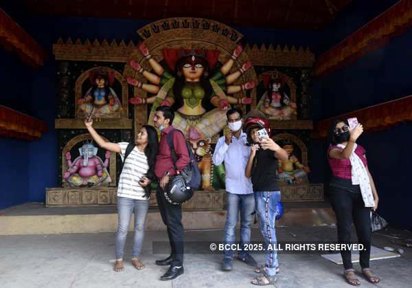 Devotees celebrate Durga Puja with COVID-19 safety protocols