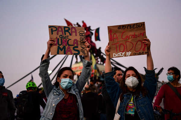 Chileans vote by millions to tear up Pinochet's constitution