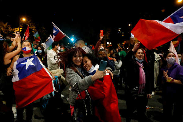 Chileans vote by millions to tear up Pinochet's constitution