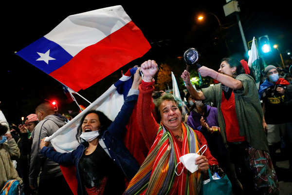 Chileans vote by millions to tear up Pinochet's constitution