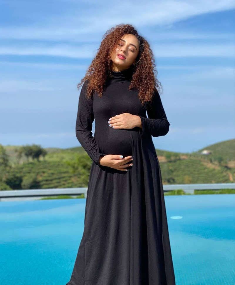 Pearle Maaney flaunts her baby bump as she enjoys babymoon in Vagamon