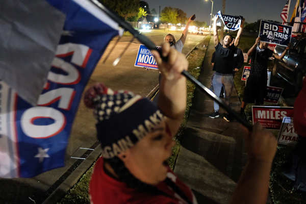 Viral pictures of nail-biting scenes from election results in the United States