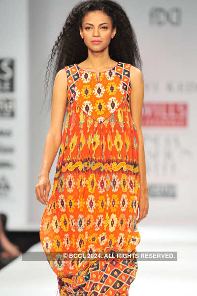 A model showcases a creation by designer Tanvi Kedia on Day 3 of the ...