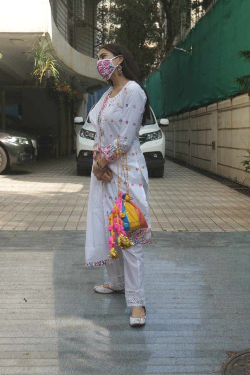 Photos: Sara Ali Khan looks like a vision in her white traditional attire as she gets snapped outside a studio in the city | Hindi Movie News - Times of India