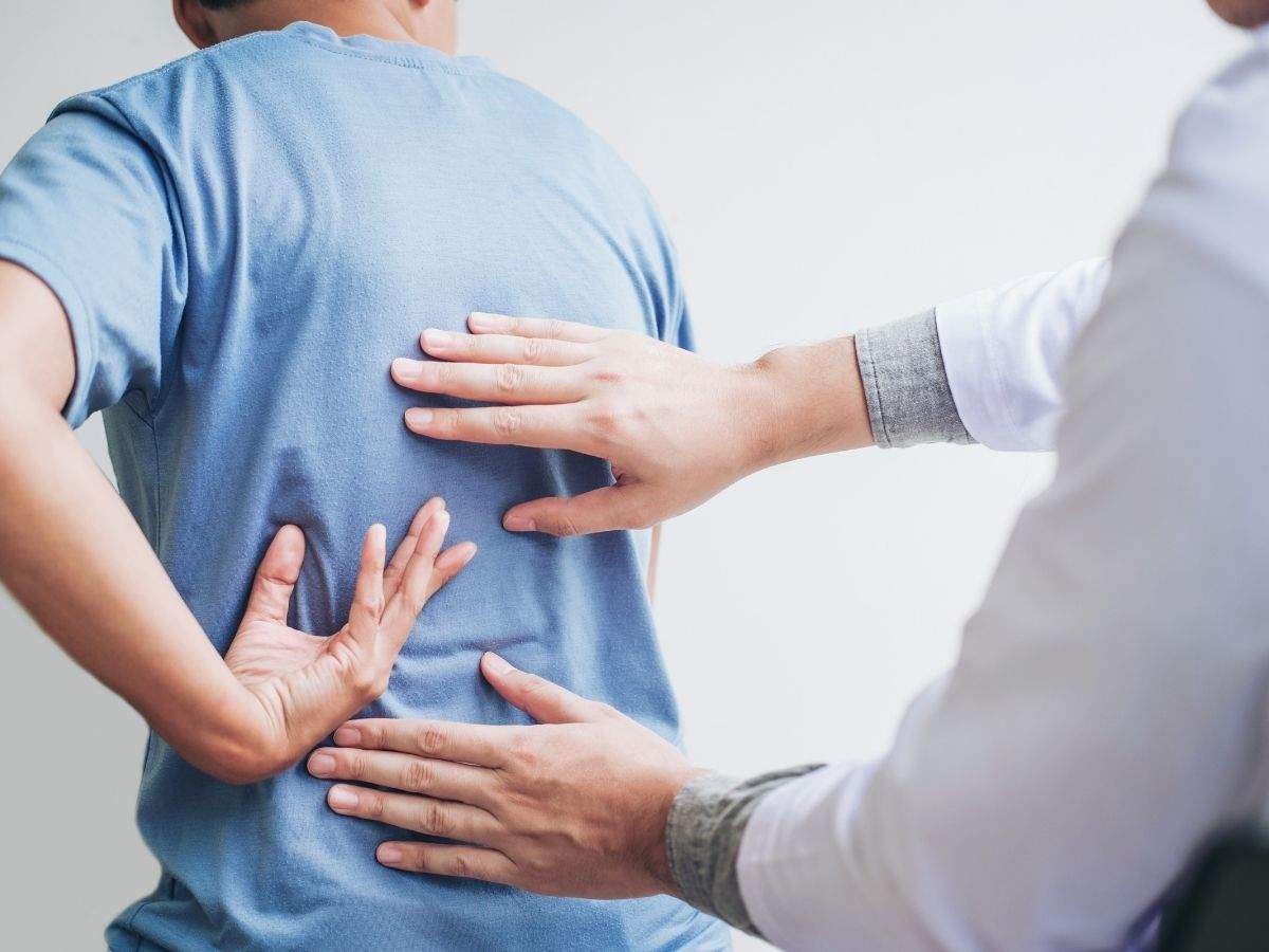 Coronavirus: Muscle or back pain can be a less common symptom of COVID-19,  here&#39;s how? | The Times of India