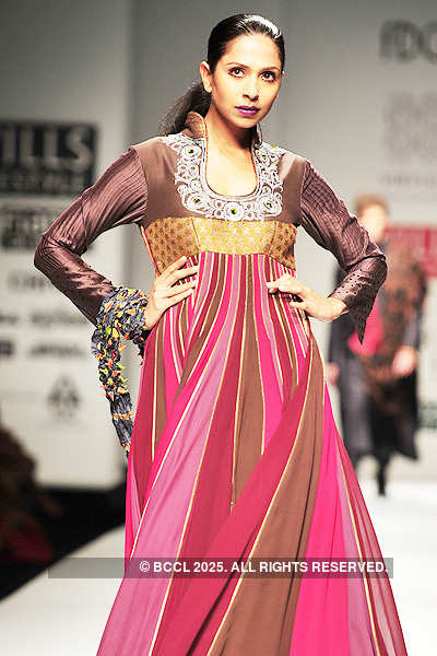 A model showcases a creation by designers Ashish Viral and Vikrant on ...