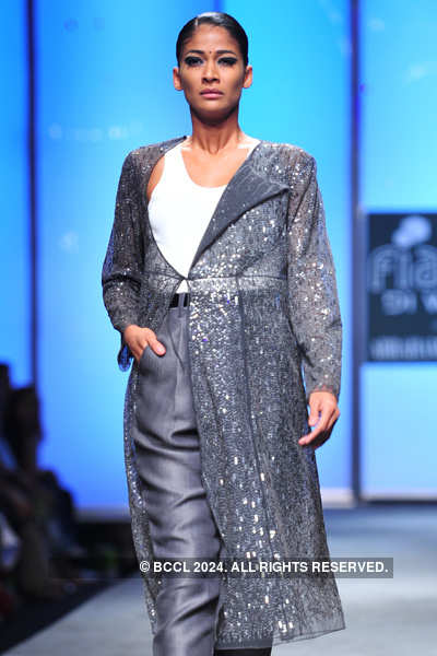 Carol showcases a creation by designers Abraham and Thakore on Day 4 of ...
