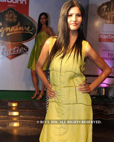 Model walks the ramp during a fashion show on the sidelines of IPL 4 ...
