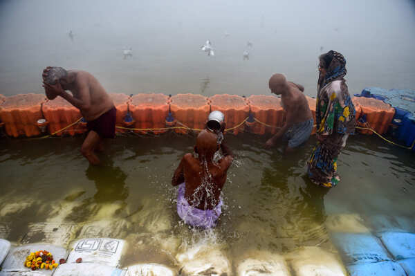 Devotees take holy dip at Sangam