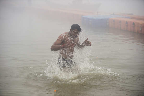 Devotees take holy dip at Sangam
