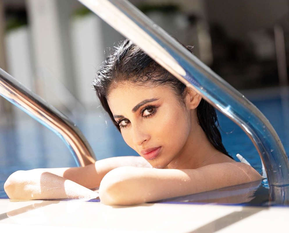 Mouni Roy is teasing her fans with her new pool pictures