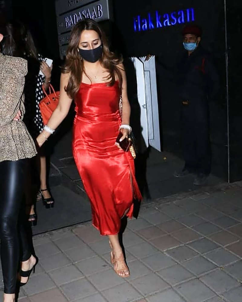 Newly-wed Natasha Dalal is making heads turn in a thigh-high slit dress on dinner outing